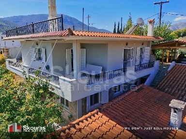 Μονοκατοικία, 210τ. μ.