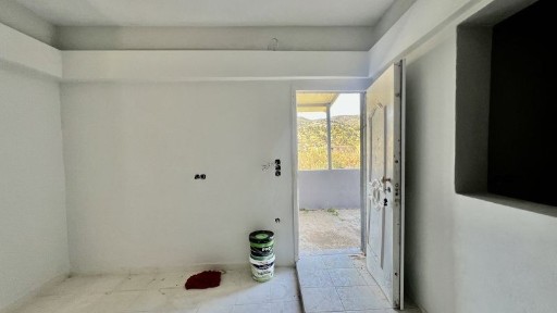 Μονοκατοικία, 77τ. μ.